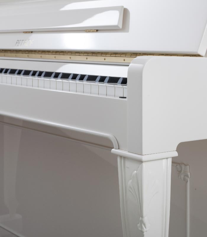 Photo detail of the keyboard and body of the Upright Piano Petrof P118 C1