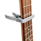 Photo of the Capo Leon SUC 01 in the neck of an ukulele