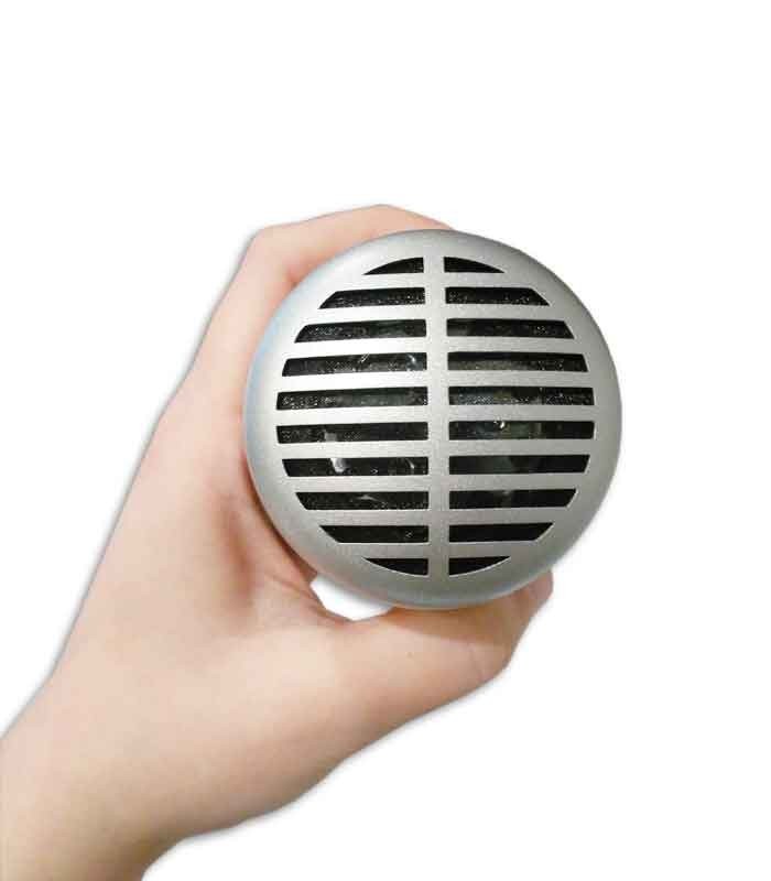 Frontal  photo of microphone Shure SH 520DX for harmonica in the hand